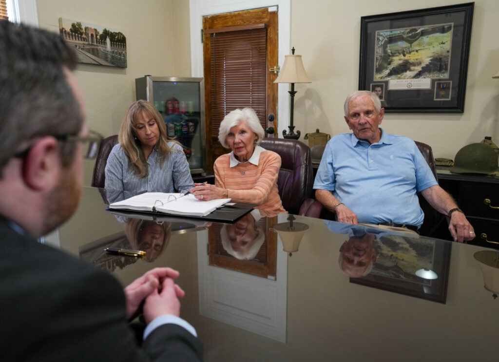 Utah attorney, Chris Morgan, meets with clients to discuss their estate planning.